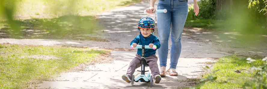 What is the recommended age for a sit and ride scooter?